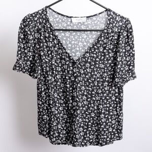 Elodie black and white flower print blouse.